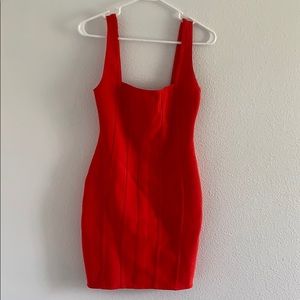 Red ribbed bodycon dress.